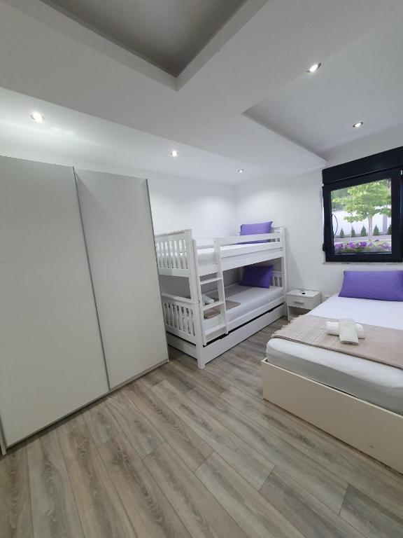 Postel nebo postele na pokoji v ubytování Luxury Villa Magic