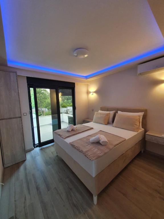 Postel nebo postele na pokoji v ubytování Luxury Villa Magic