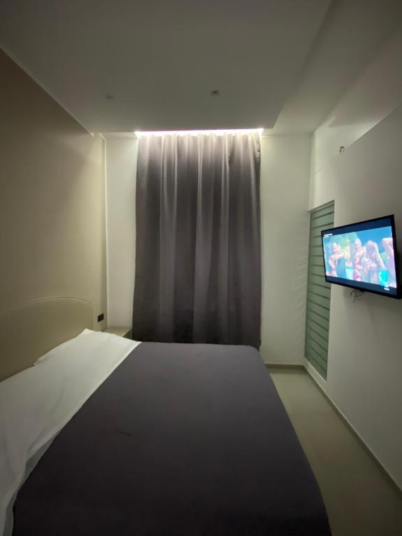 Posteľ alebo postele v izbe v ubytovaní Room25mq