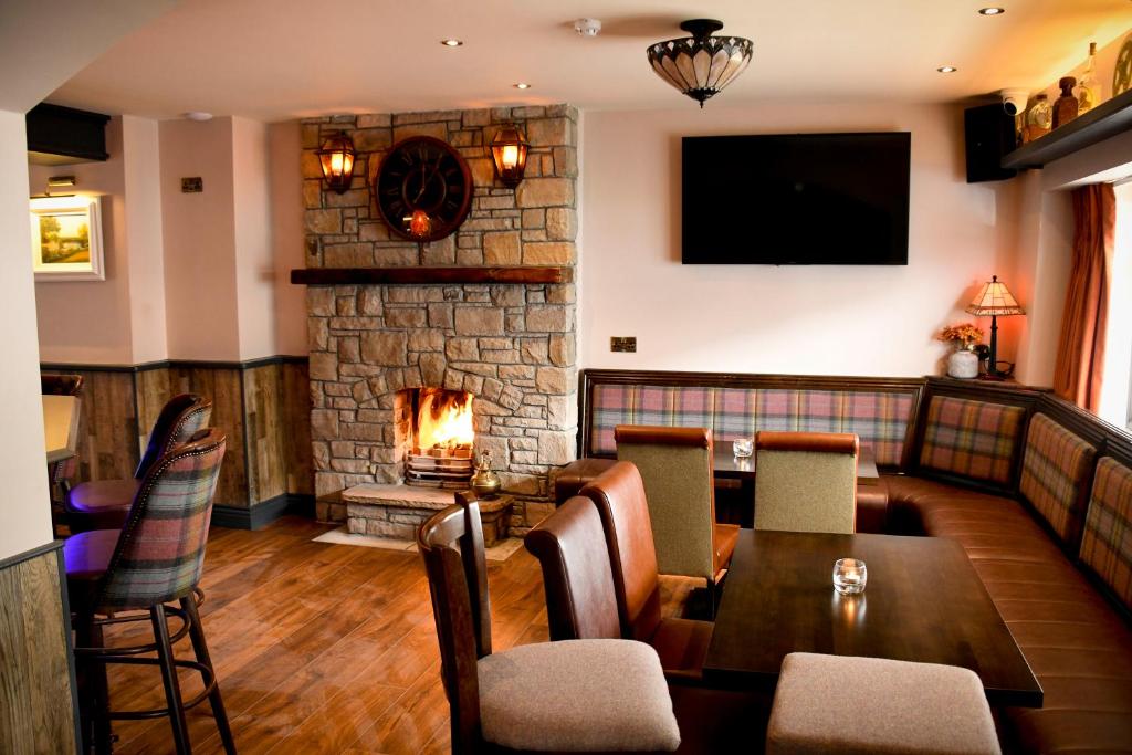 Posezení v ubytování The Leitrim Inn and Blueway Lodge