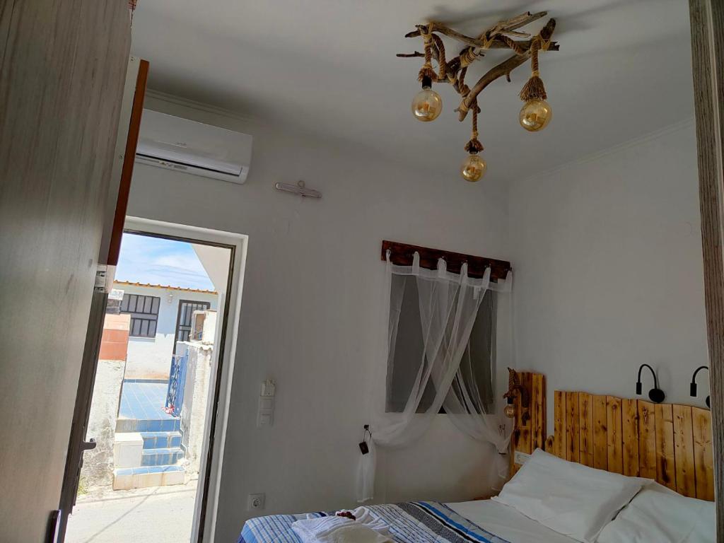 Postel nebo postele na pokoji v ubytování Sea Sound Haraki apartment