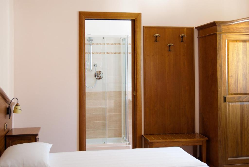 Postel nebo postele na pokoji v ubytování B&B Angela