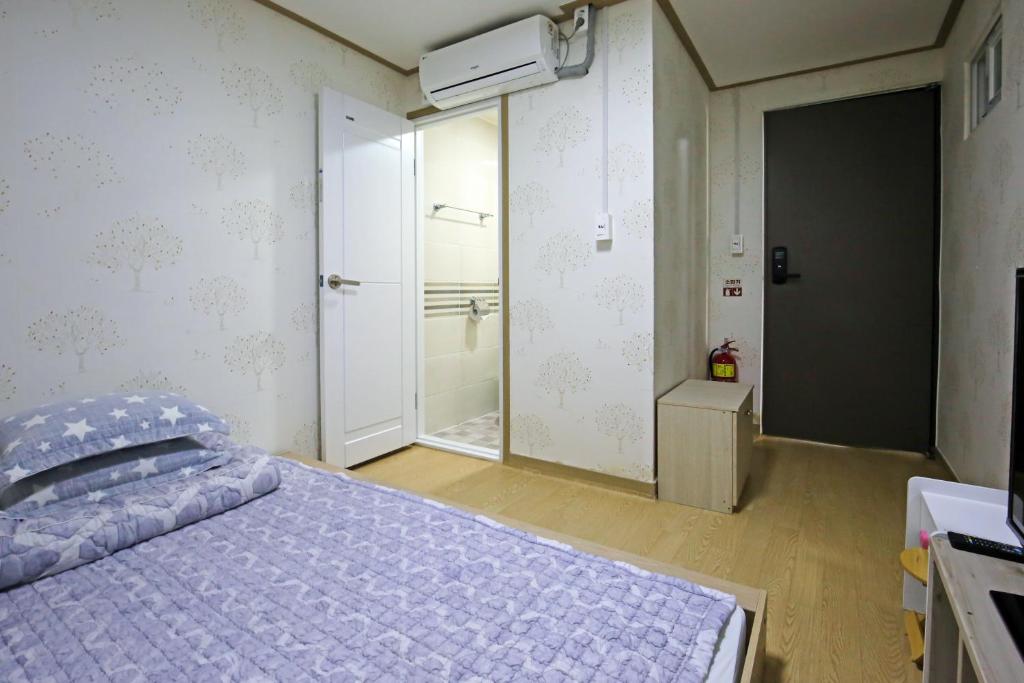 Postel nebo postele na pokoji v ubytování Dashim Guest House