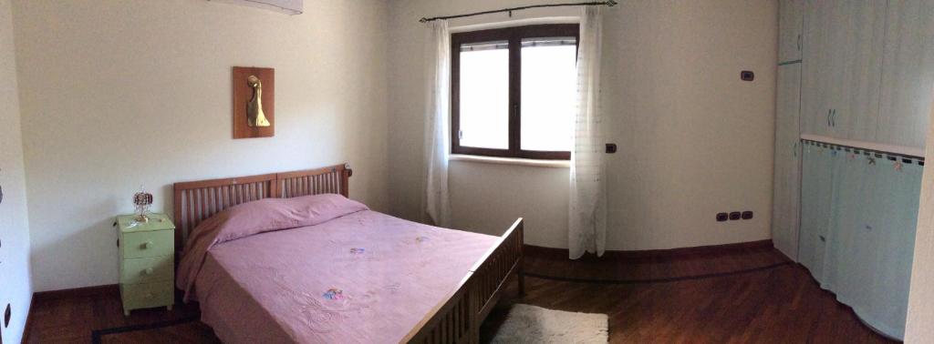 Postel nebo postele na pokoji v ubytování Villa Civita