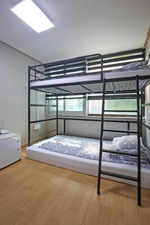 Postel nebo postele na pokoji v ubytování Dashim Guest House