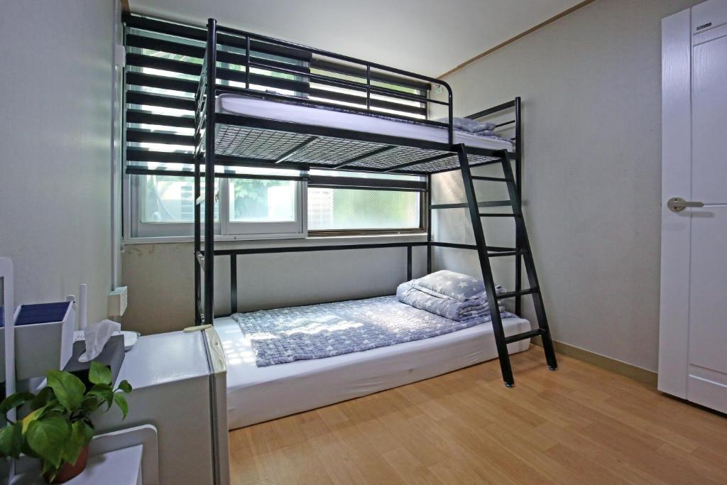Postel nebo postele na pokoji v ubytování Dashim Guest House
