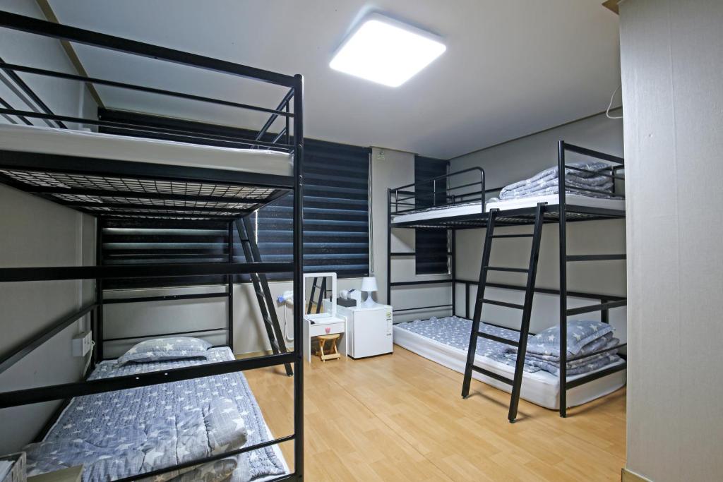 Postel nebo postele na pokoji v ubytování Dashim Guest House