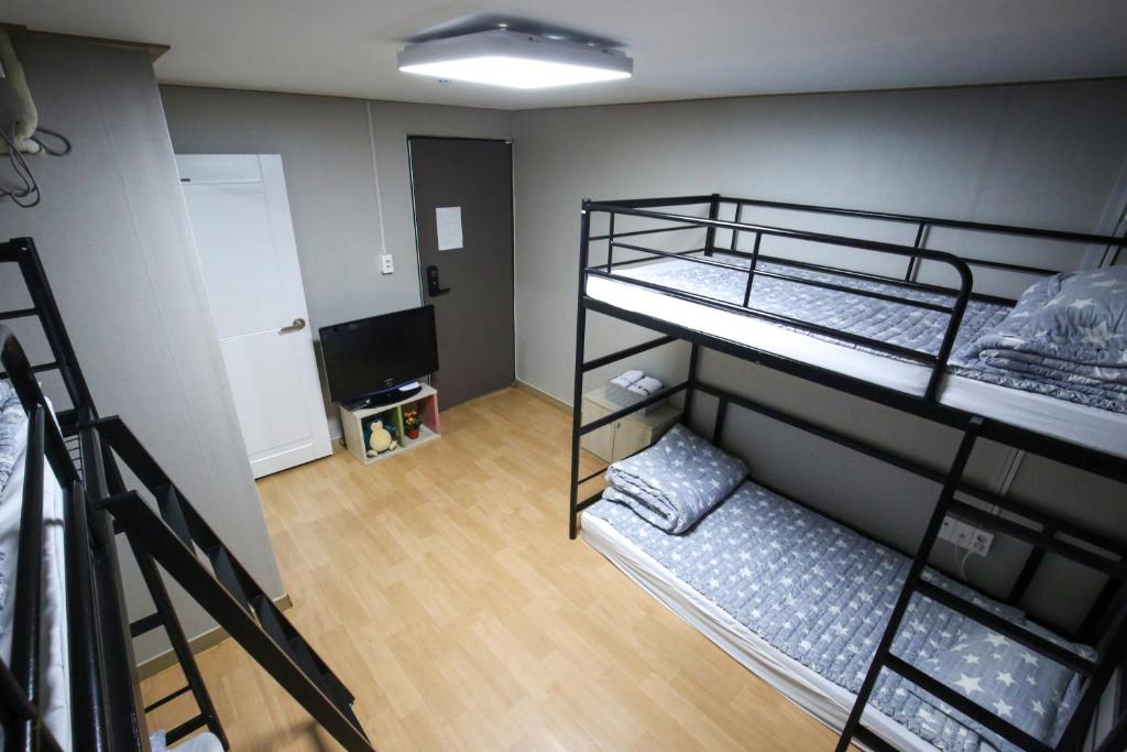 Postel nebo postele na pokoji v ubytování Dashim Guest House