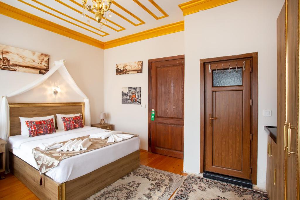Postel nebo postele na pokoji v ubytování April Story Apart Hotel