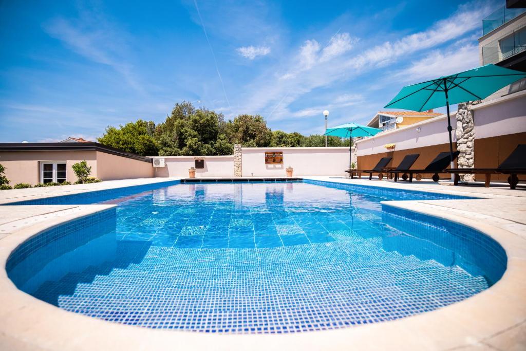 Bazén v ubytování Villa Hacienda nebo v jeho okolí