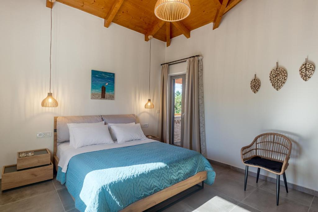 Postel nebo postele na pokoji v ubytování Tierra Olivo Villas