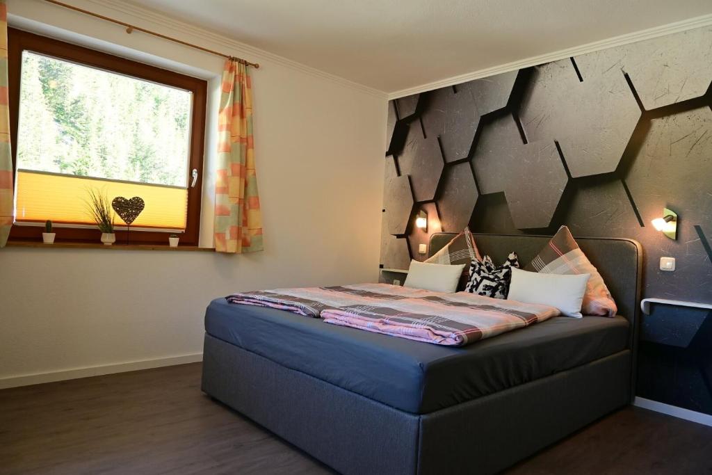 Postel nebo postele na pokoji v ubytování Appartement Wanneck