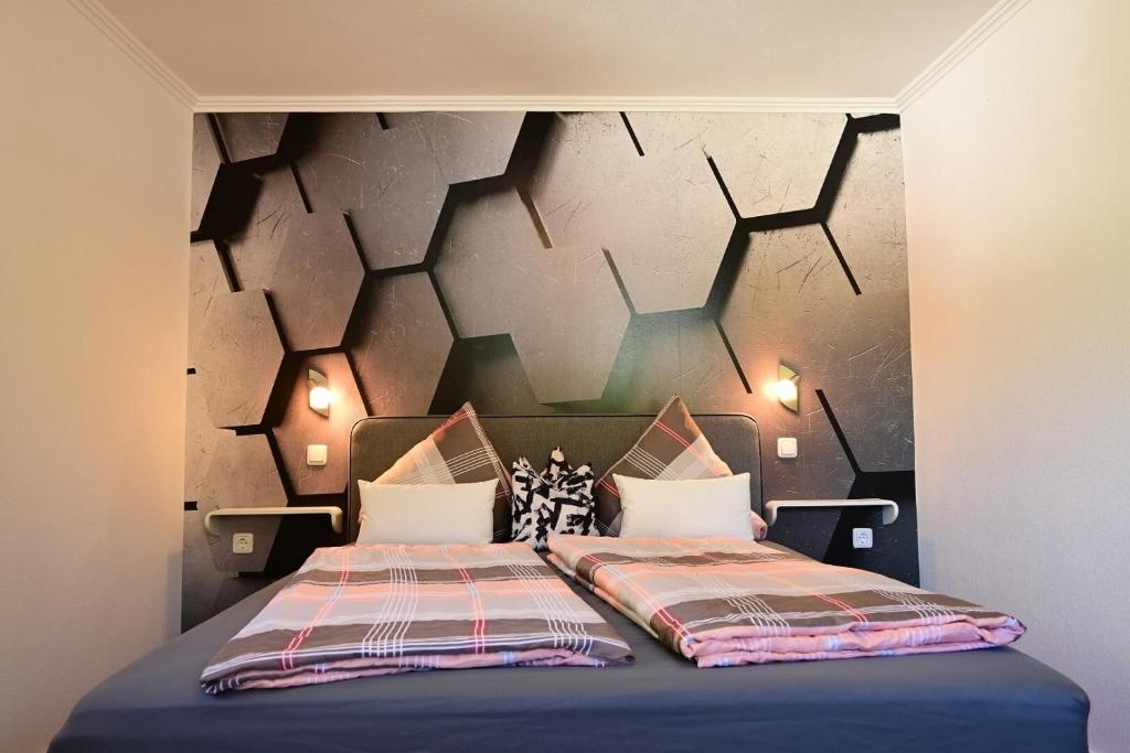 Postel nebo postele na pokoji v ubytování Appartement Wanneck
