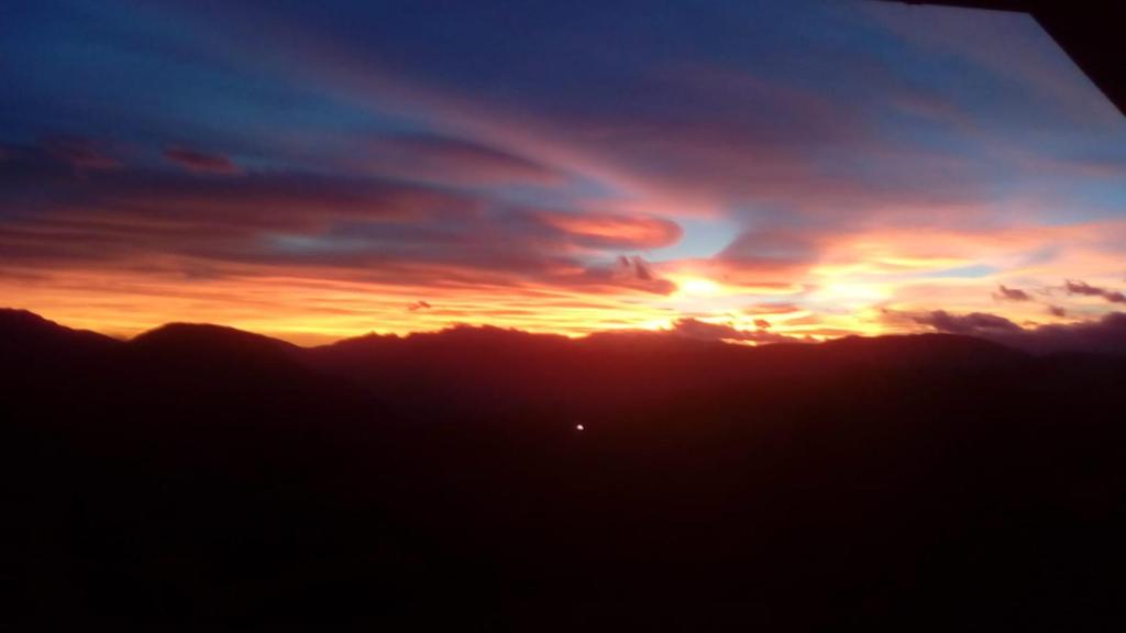 The sunrise or sunset as seen from Az apartmant or nearby