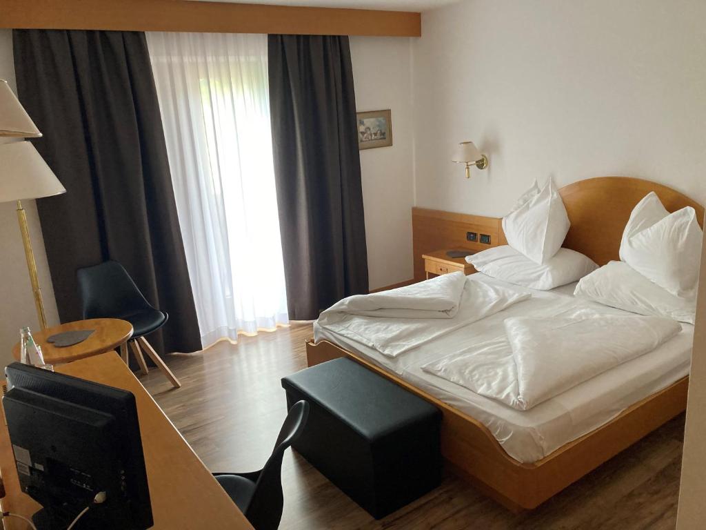 Postel nebo postele na pokoji v ubytování Hotel Simpaty