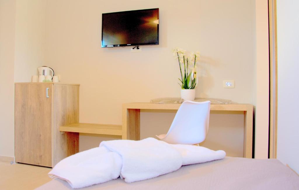 TV a/nebo společenská místnost v ubytování Hotel Petros