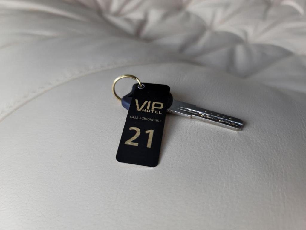 Postel nebo postele na pokoji v ubytování VIP HOTEL ZATOKA