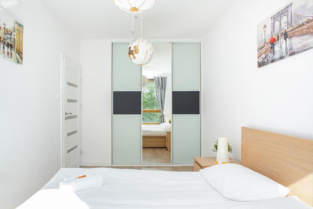 Posteľ alebo postele v izbe v ubytovaní Apartment Warsaw Business Center by Noclegi Renters