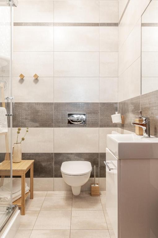 Kúpeľňa v ubytovaní Apartamenty na wzgórzu APARTZAKOP
