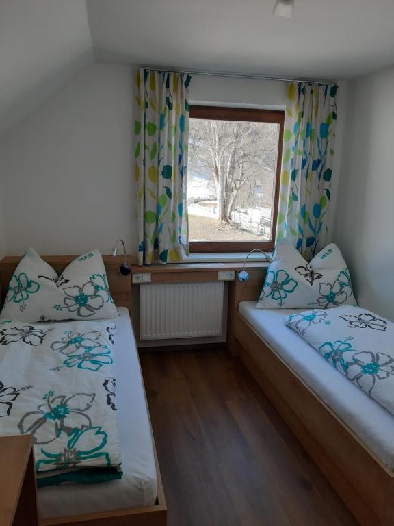 Posteľ alebo postele v izbe v ubytovaní Haus Santner