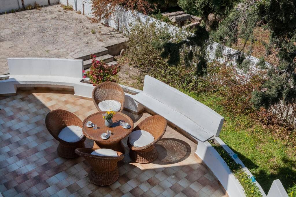 A balcony or terrace at Villa Velissarios: wonderful villa next to beach