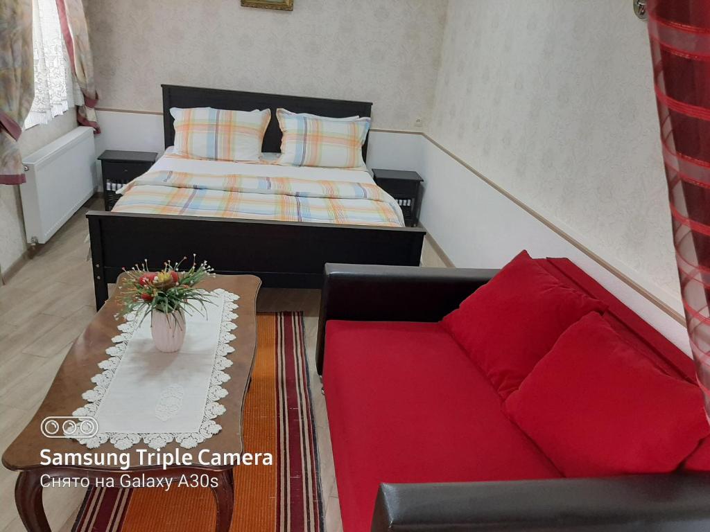 Postel nebo postele na pokoji v ubytování Guest House Ucha