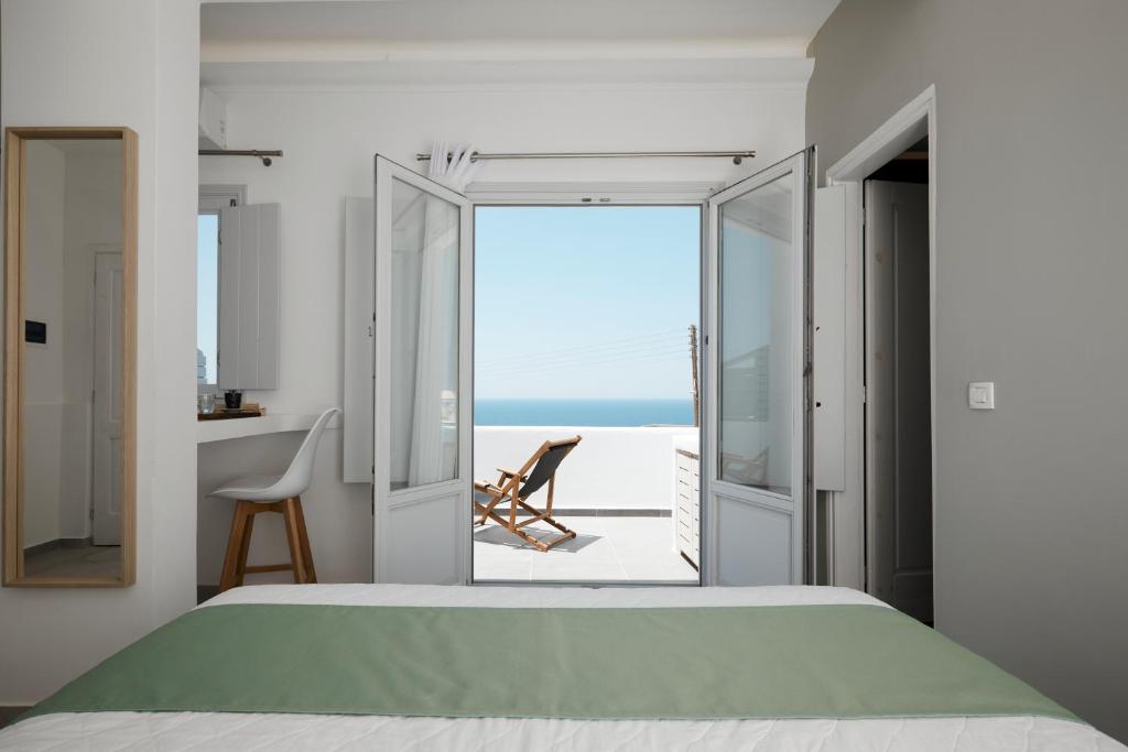 Llit o llits en una habitació de Sunset Faros
