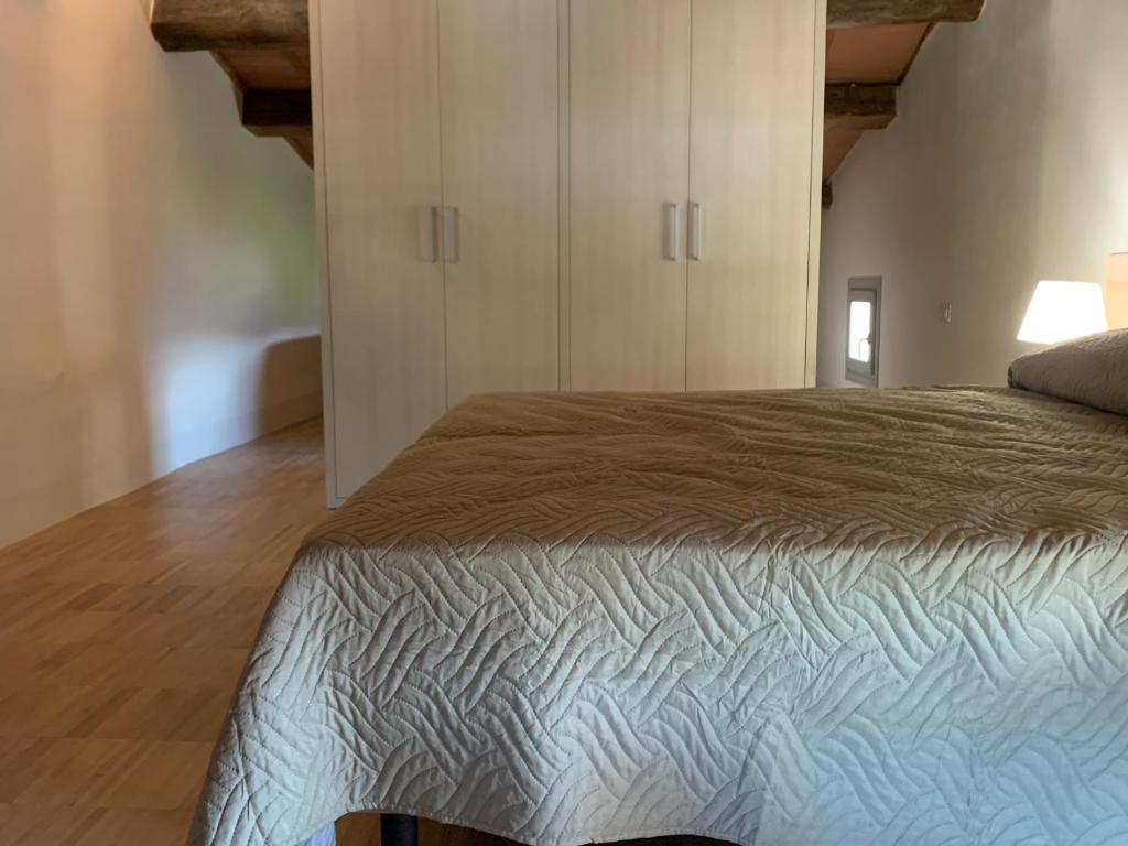 Łóżko lub łóżka w pokoju w obiekcie Relais Mevigo - Casa Padronale