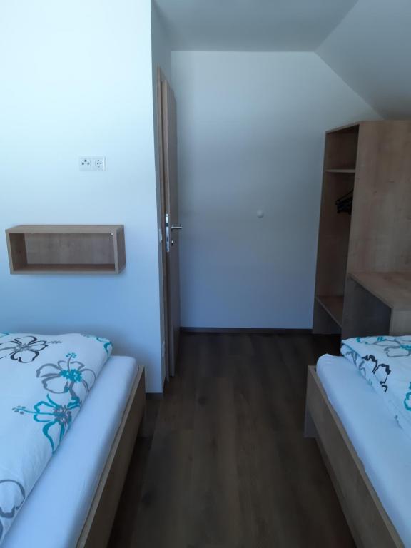 Posteľ alebo postele v izbe v ubytovaní Haus Santner
