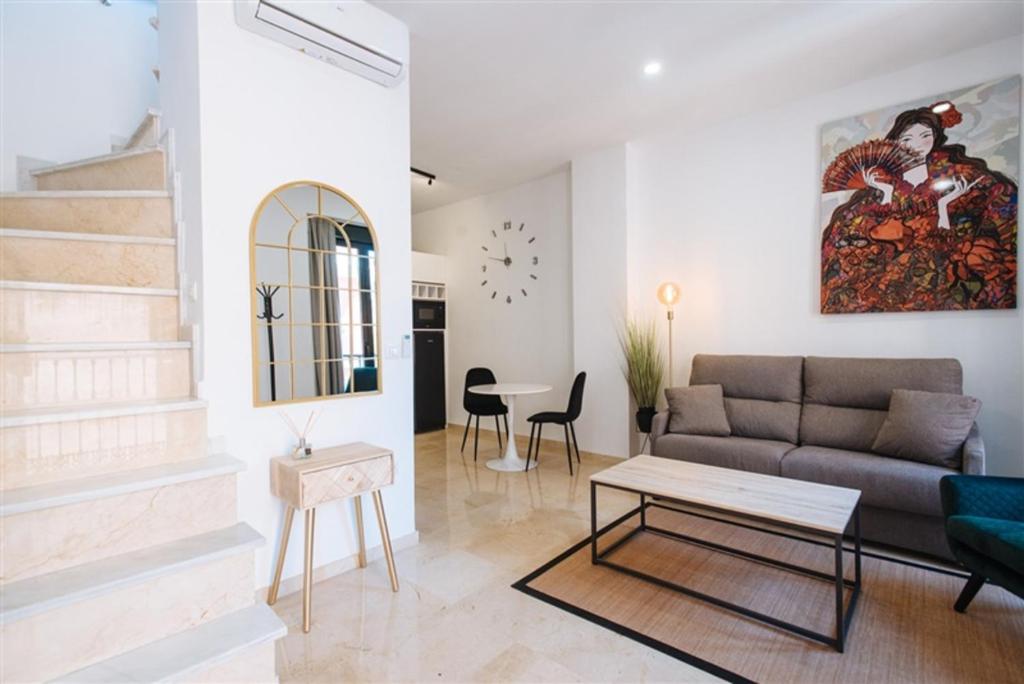 Część wypoczynkowa w obiekcie Guardamino Dúplex Suite Apartment