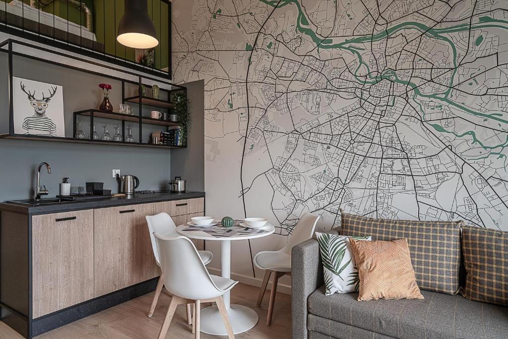Kuchyňa alebo kuchynka v ubytovaní RentPlanet - Apartamenty Zarembowicza II