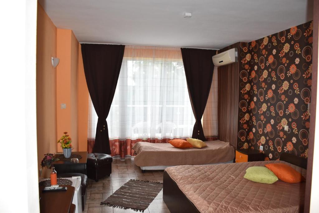 Postel nebo postele na pokoji v ubytování Hotel Sea Star Приморско