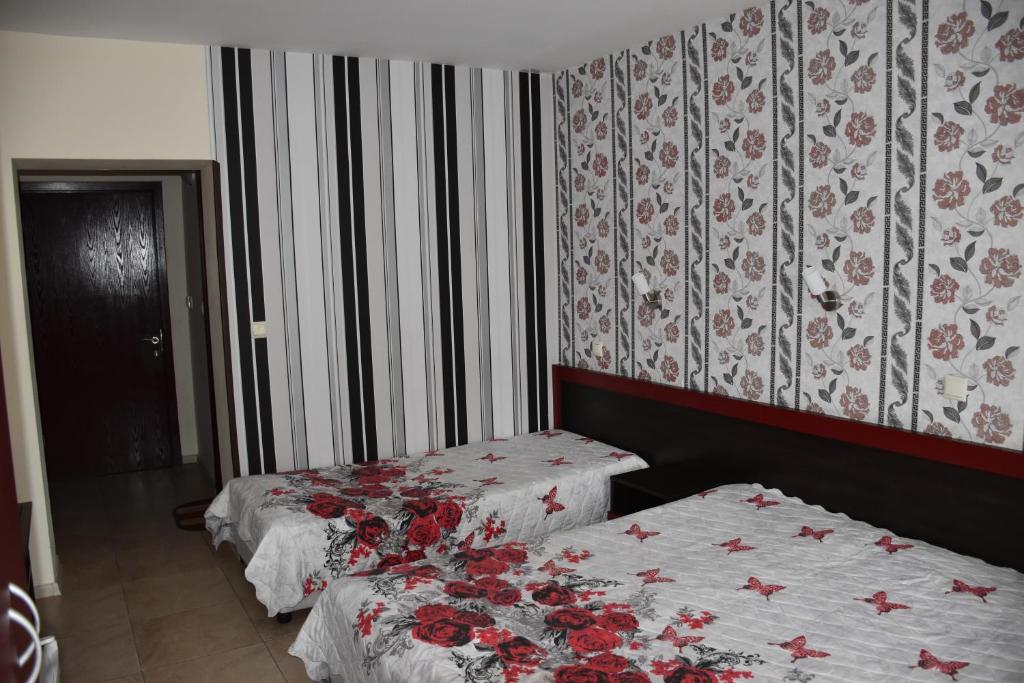 Postel nebo postele na pokoji v ubytování Hotel Sea Star Приморско