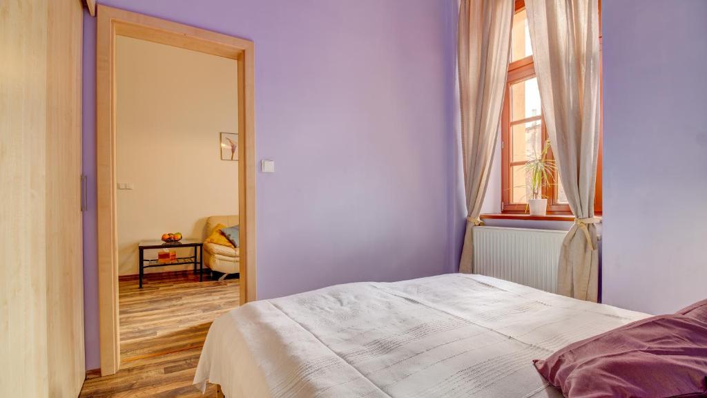 Postel nebo postele na pokoji v ubytování Boromeum Residence