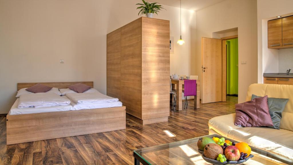 Postel nebo postele na pokoji v ubytování Boromeum Residence