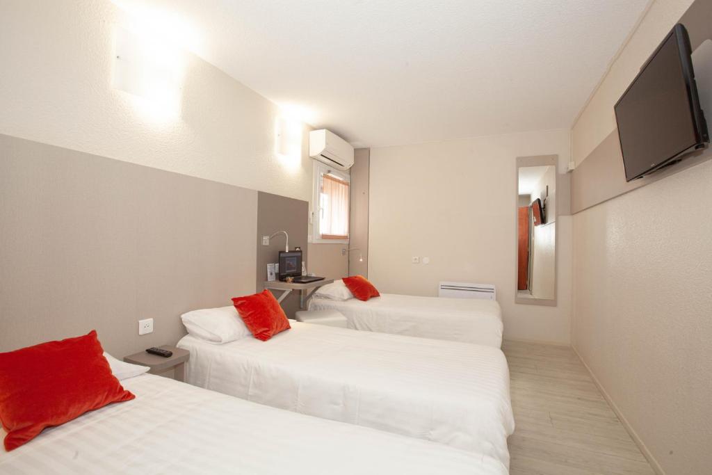 Postel nebo postele na pokoji v ubytování Best Hotel Lyon - Saint Priest