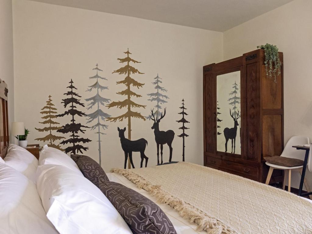 Postel nebo postele na pokoji v ubytování Hotel Funivia