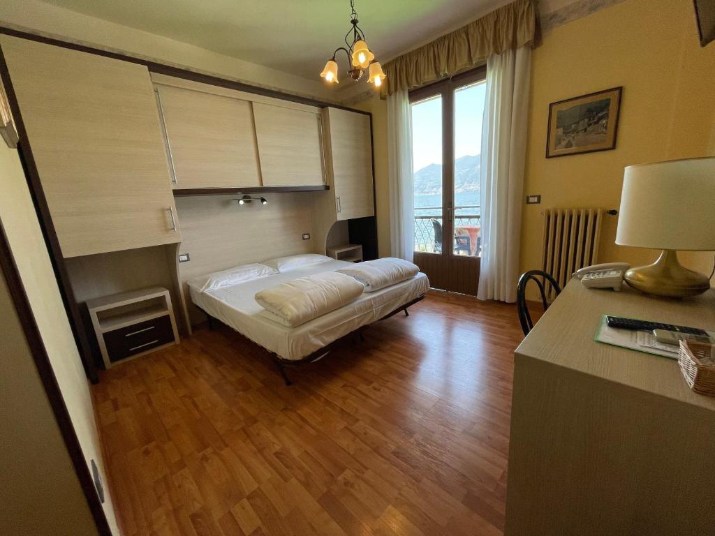Postel nebo postele na pokoji v ubytování Hotel Rabay