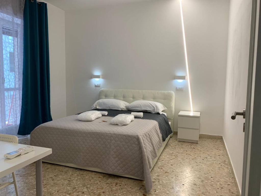 Posteľ alebo postele v izbe v ubytovaní Catania Apartment Borgo Suite Autonomous