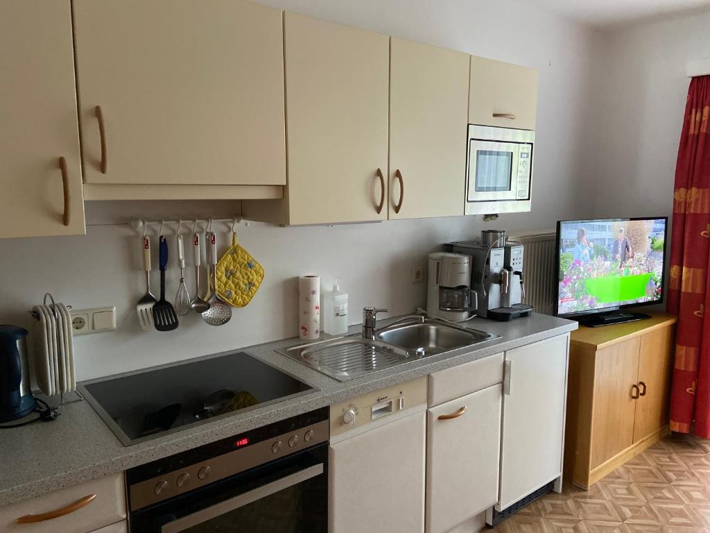 Kuchyň nebo kuchyňský kout v ubytování Appartement Hubner