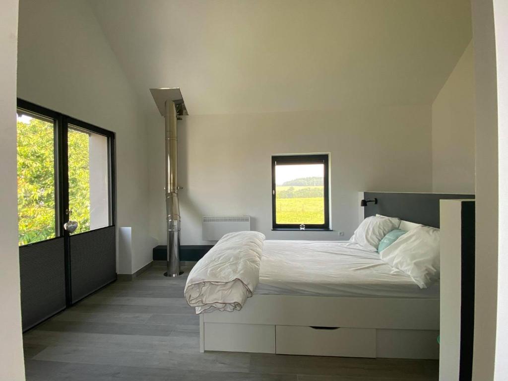 Postel nebo postele na pokoji v ubytování Honey House