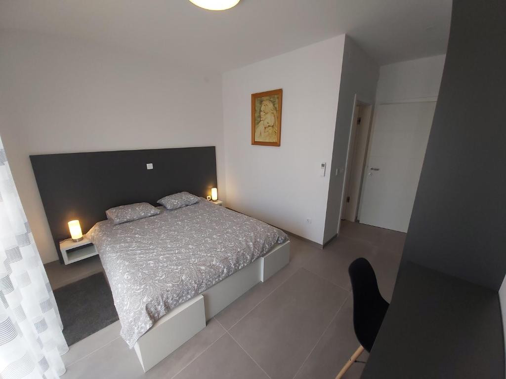 Posteľ alebo postele v izbe v ubytovaní Sun Rays Apartments