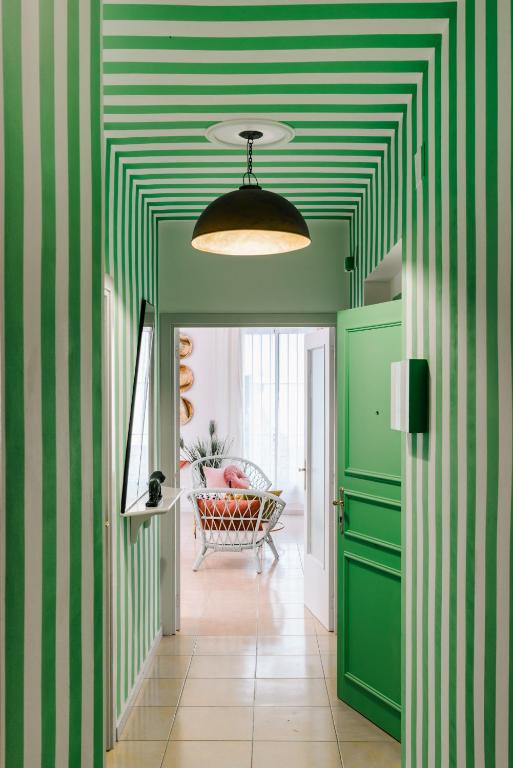 A seating area at 1840 Apartments Sitges by Suma Hotels