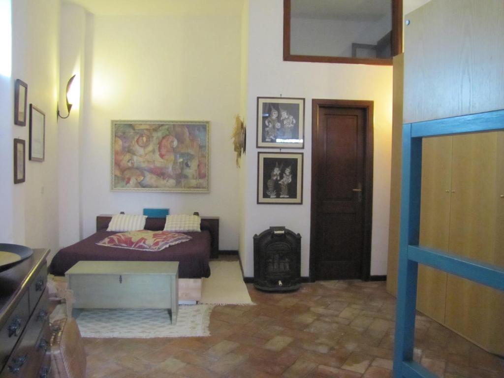 A bed or beds in a room at Amore Rentals - Villa Era