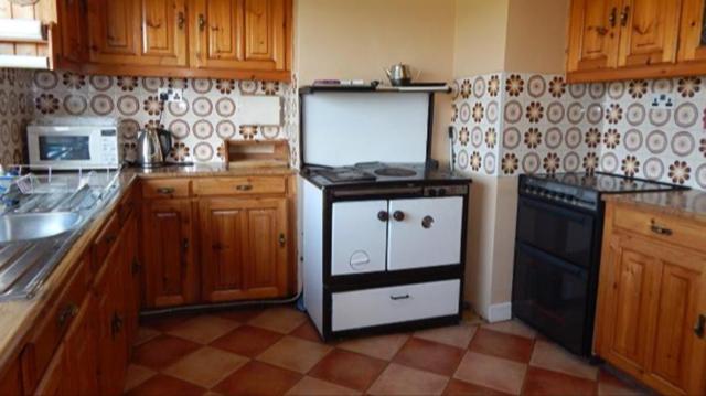 Kuchyň nebo kuchyňský kout v ubytování The Bungalow