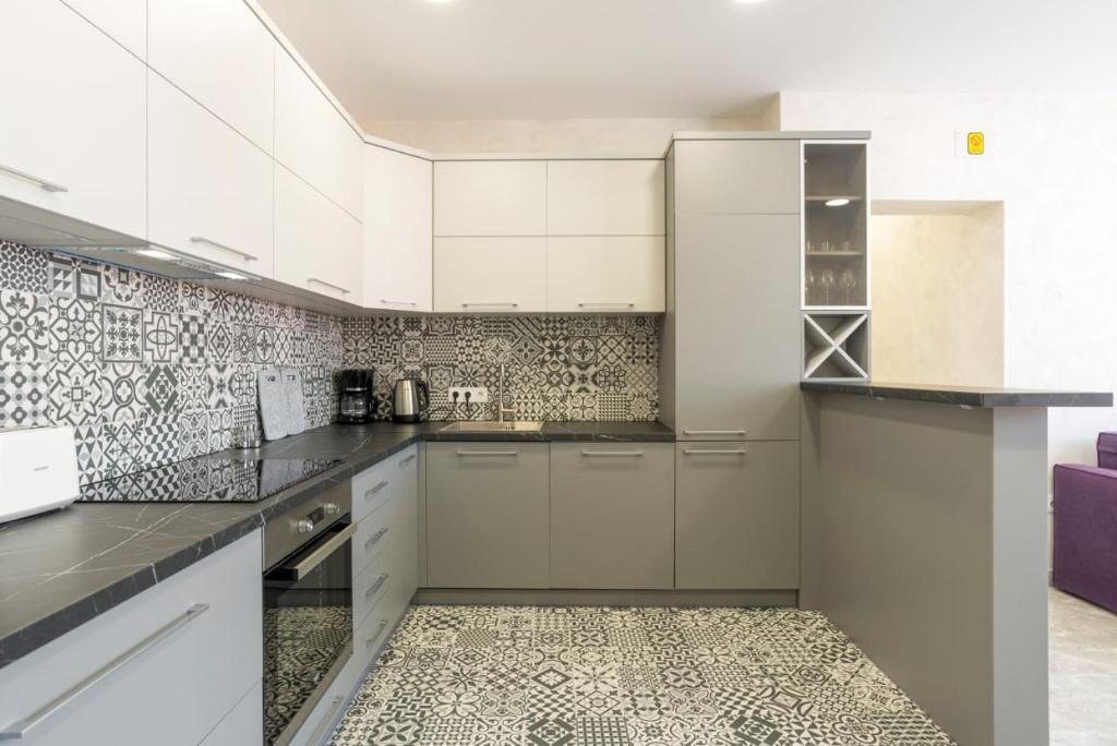 Kuchyň nebo kuchyňský kout v ubytování Dream House Rooms Malaga - Habitacion en el apartemento
