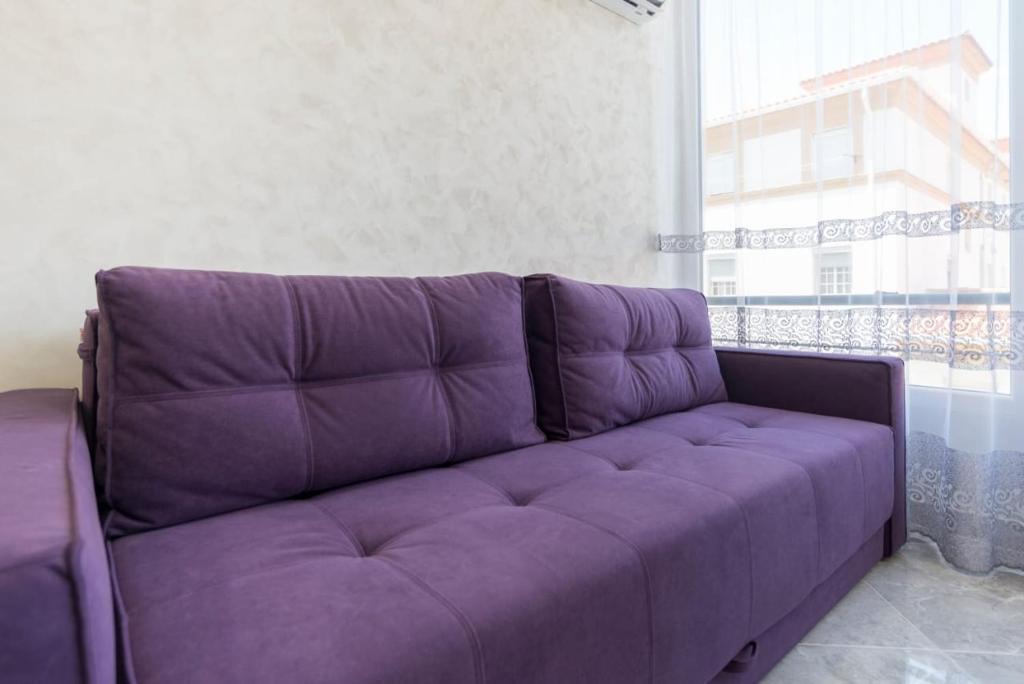 Posezení v ubytování Dream House Rooms Malaga - Habitacion en el apartemento