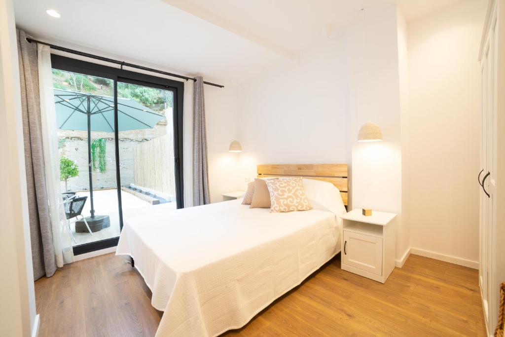 Postel nebo postele na pokoji v ubytování Apartaments Voralmar