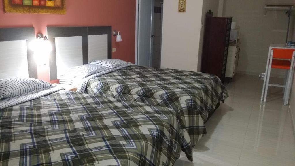 Postel nebo postele na pokoji v ubytování Dreams Hotel Puerto Rico