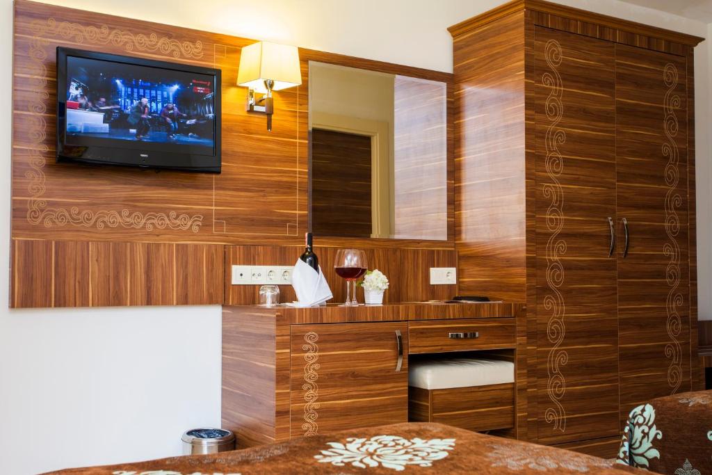 TV a/nebo společenská místnost v ubytování Oba Time Hotel